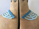 Art deco geometric tapework collar in sky blue with royal blue edging