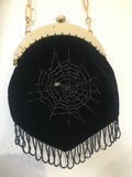 Late 1920s to 30s butterfly and spider hand beaded evening purse in black velvet on ivorine frame