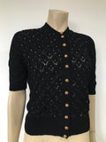 Vintage knitted cardigan with filigree bass buttons and gelatine sequins