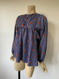1970s vintage blue and white striped smock top with balloon sleeves and floral print