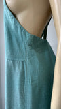 1920s / 1930s romper overalls or dungarees in turquoise linen with white piped trim