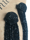 Matched pair of antique French jet or black glass beaded tassel trims