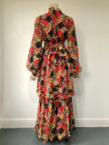 1970s vintage Angela Gore tiered maxi dress with balloon sleeves