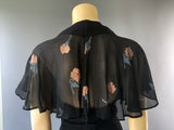 1970s boutique era vintage crepe plunge front Paul Nicholas jumpsuit with floral chiffon