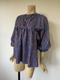 1970s vintage blue and white striped smock top with balloon sleeves and floral print