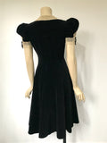 1930s black velvet party dress ‘Original Junior by Dorsa’ with puffed sleeves and eyelet lace trim - Fashion Originators Guild Of America