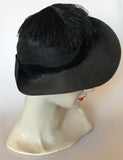 Vintage 1930s black tilt feather hat with velvet trim