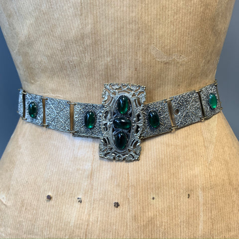 Victorian revival pressed filigree style metal belt with green glass foil backed cabochons