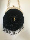 Late 1920s to 30s butterfly and spider hand beaded evening purse in black velvet on ivorine frame