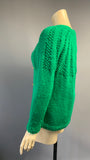 Vintage 1970s green cable detailed chunky knit cardigan with Bakelite toggles